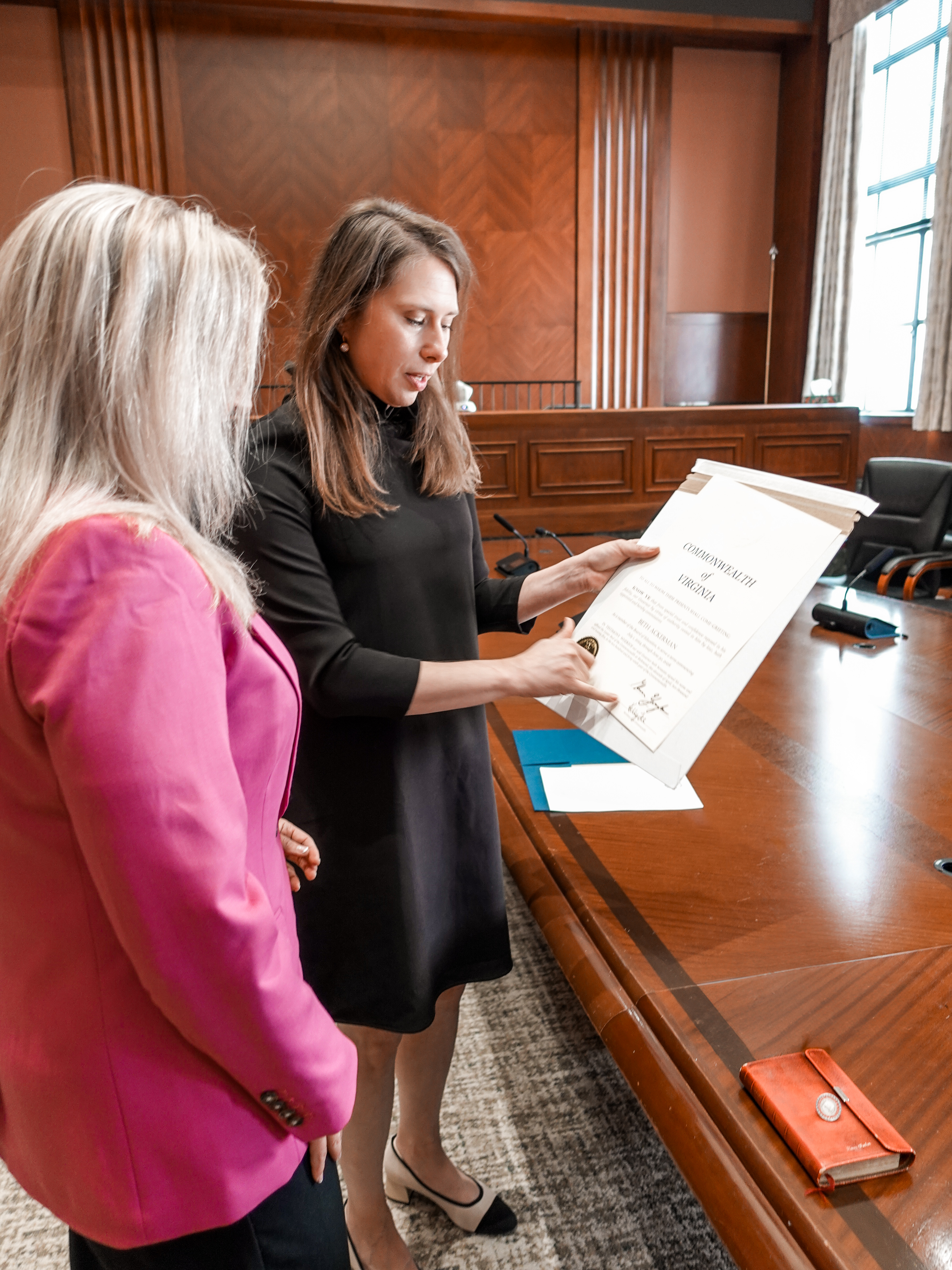 Dr. Beth Ackerman taking oath with her family