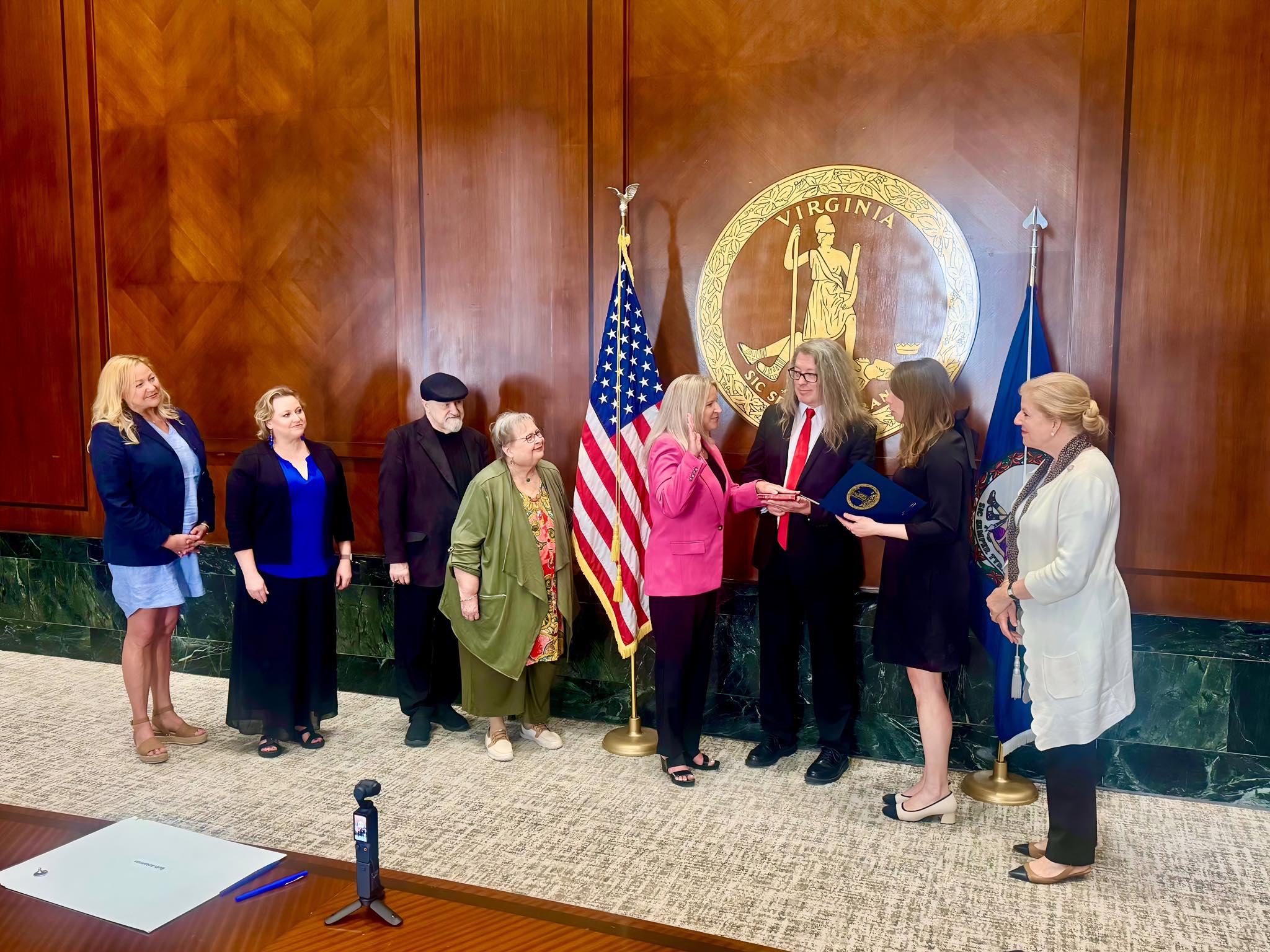 Dr. Beth Ackerman taking oath with her family